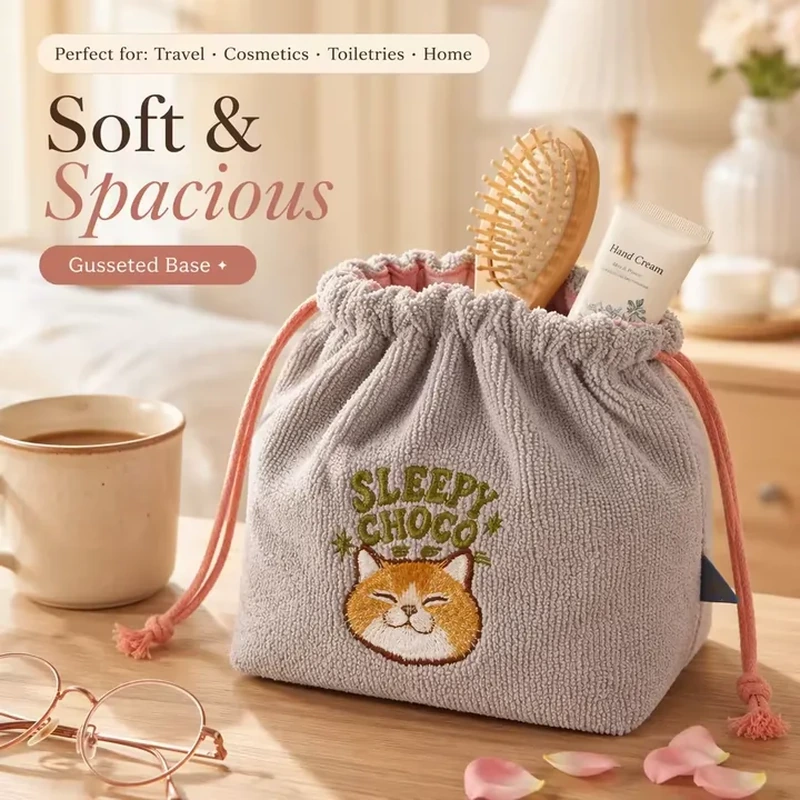 Gray loop-textured drawstring organizer with a square base, pink cords and animal embroidery
