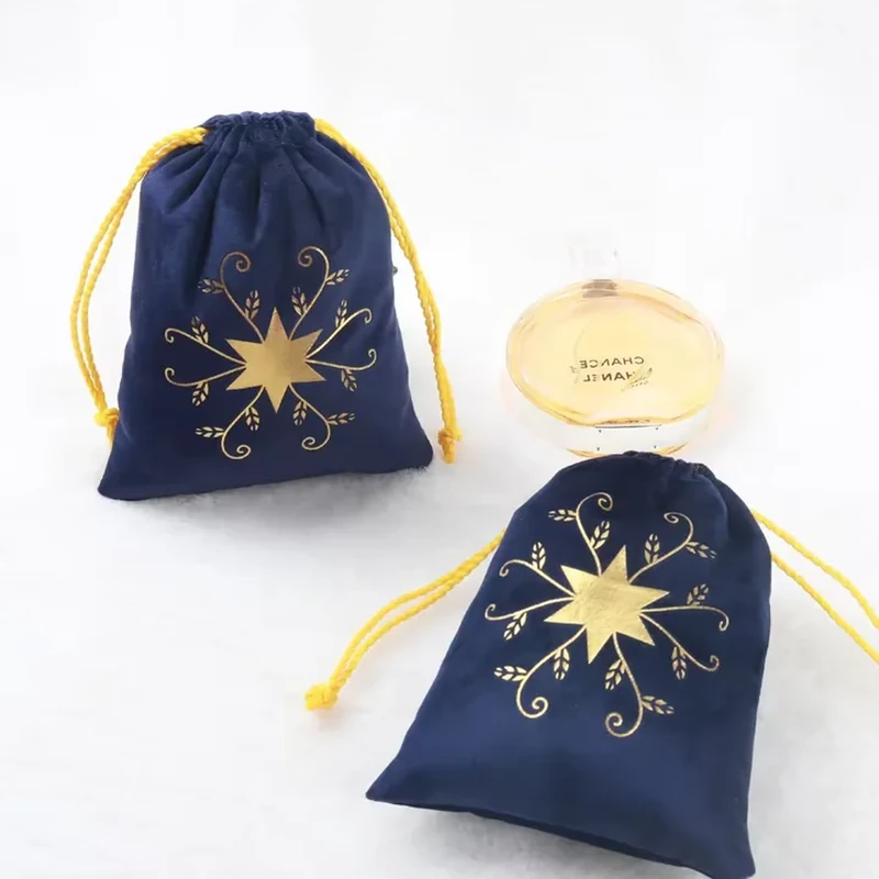 A star and ornamental line motif fills the front of this drawstring pouch