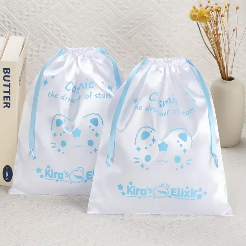 A character illustration and star accents fill a satin drawstring bag with long matching ribbons