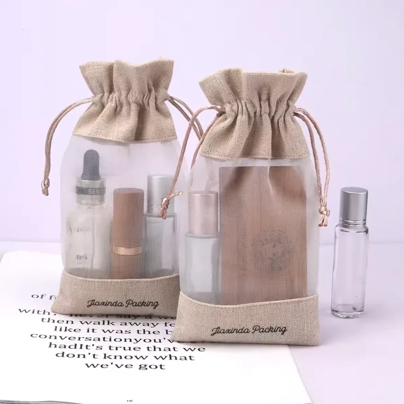 Woven cosmetic drawstring bags with clear central windows showing bottles