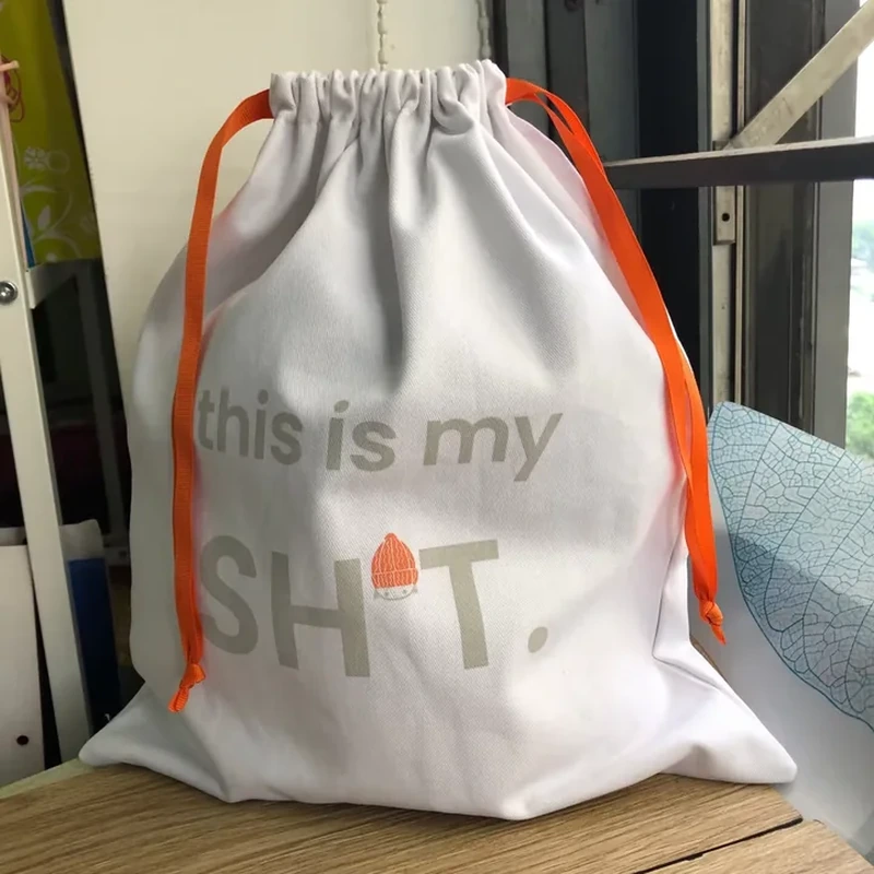A tall pale sack uses bright side cords and a large typographic front design