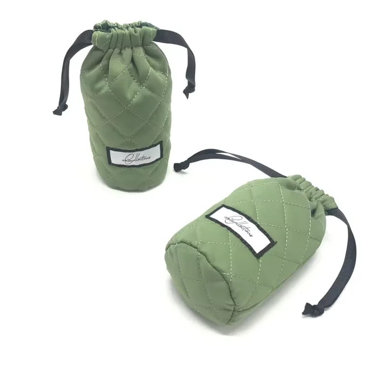 A compact green pouch uses a circular base, gathered top and a small front label