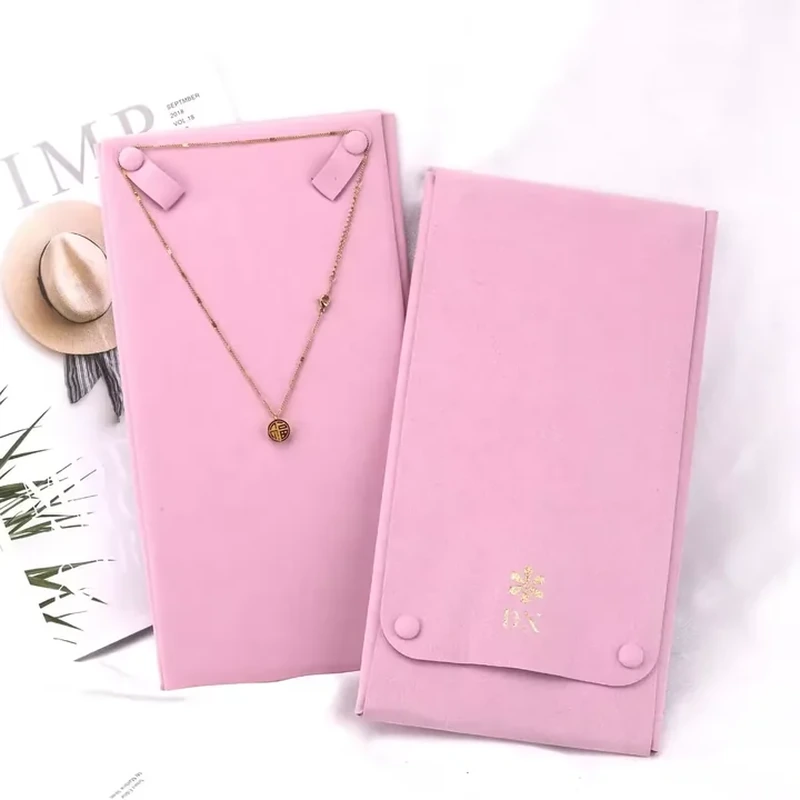 A long necklace presentation panel folds into a case with two covered snaps