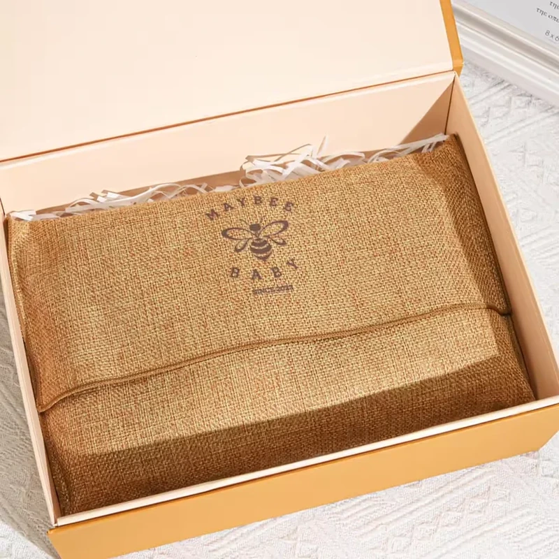 Natural coarse woven envelope pouch with a broad printed foldover flap