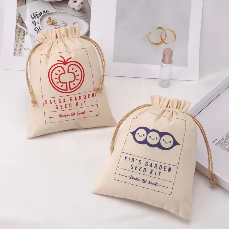 A pale drawstring pouch features garden produce line artwork and a centered decorative print