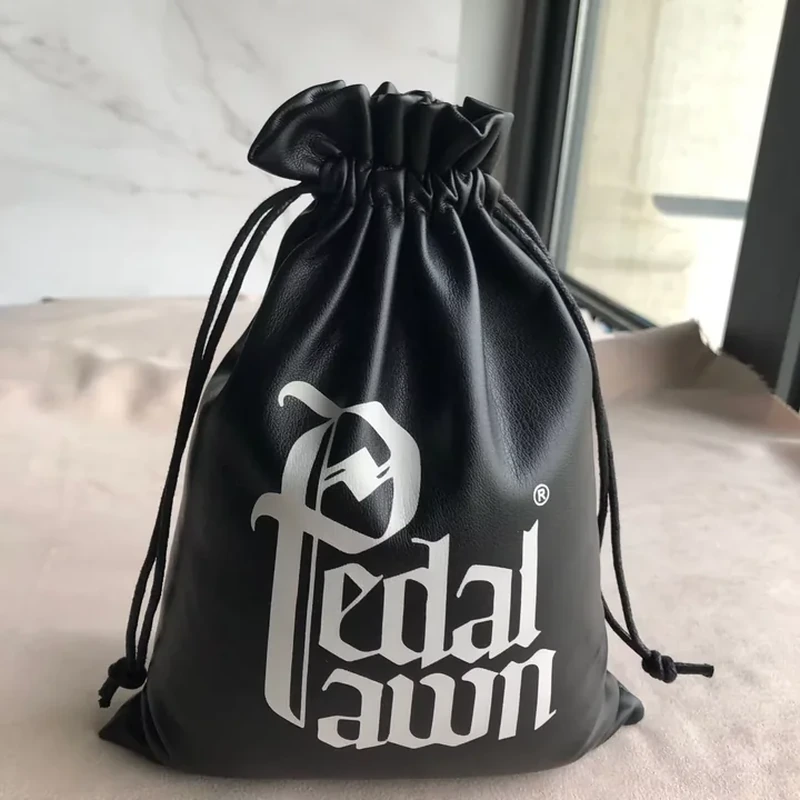 Glossy black leather-look drawstring sack with a wide gathered neck