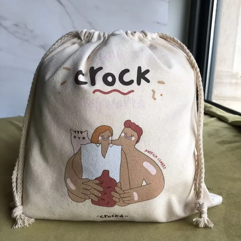 A broad drawstring bag features embracing illustrated figures and a rounded lower silhouette