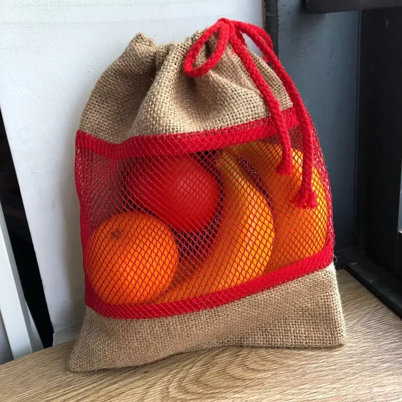 Natural woven drawstring sack with red mesh window and red cords