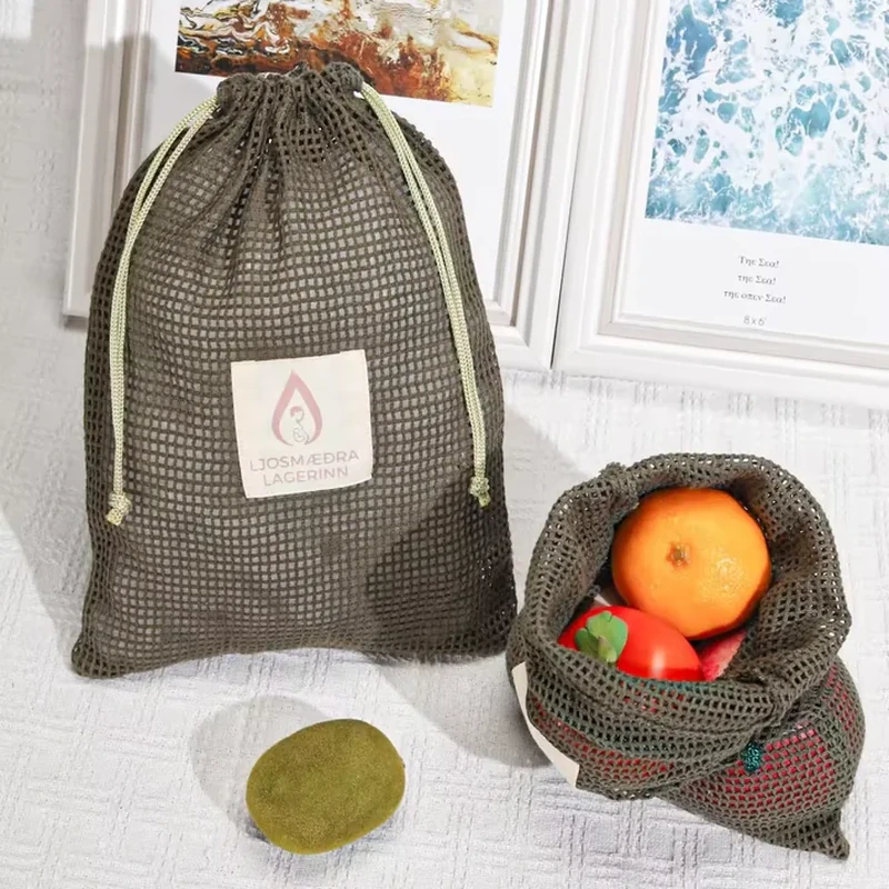 Tall olive open-mesh sack with cream cords and a rectangular front label