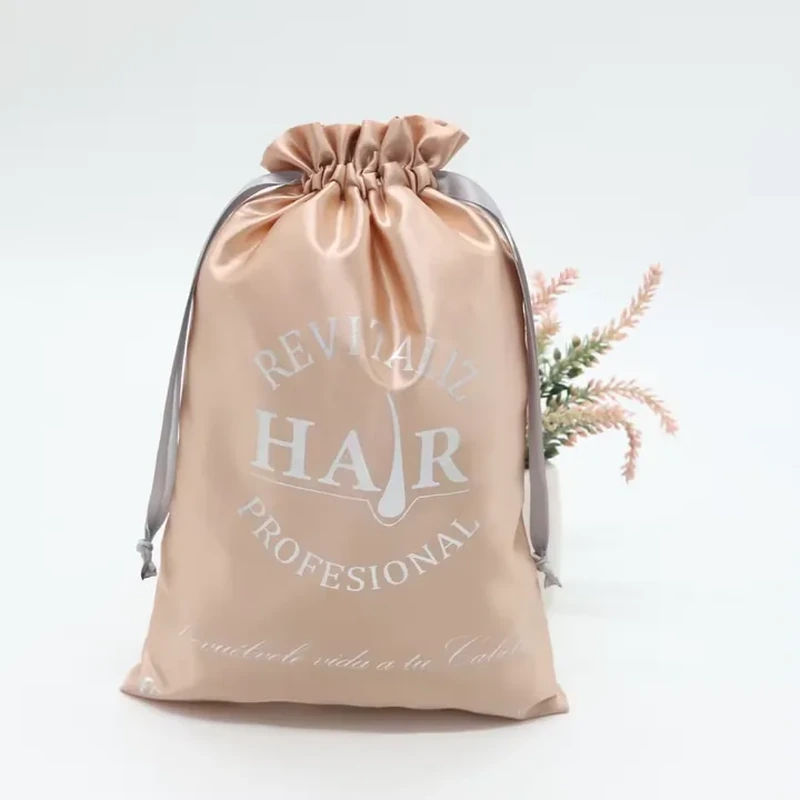 A tall satin bag combines a ruffled top with fine side cords and front graphics