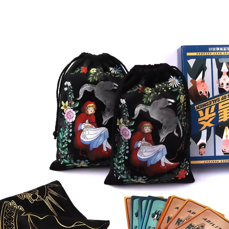 A storybook scene and a floral border cover a dark drawstring pouch