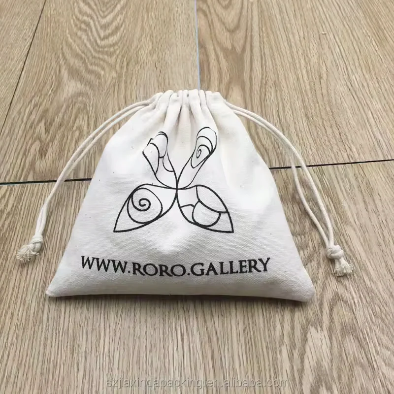 Cream drawstring pouch with a black abstract line design
