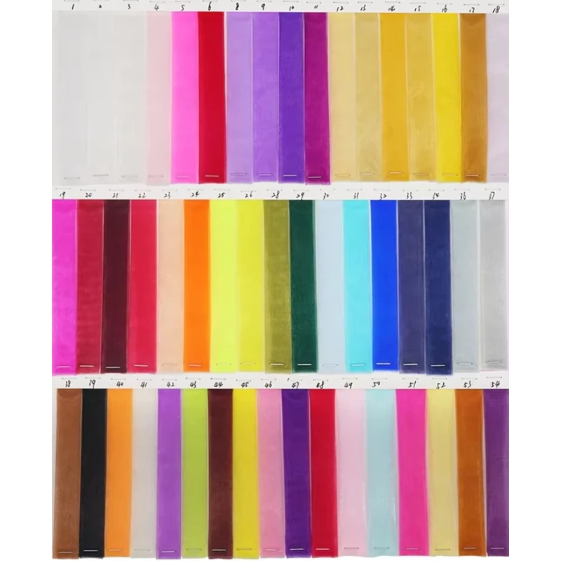 Three rows of physical fabric color swatches in bright, pastel and dark colors