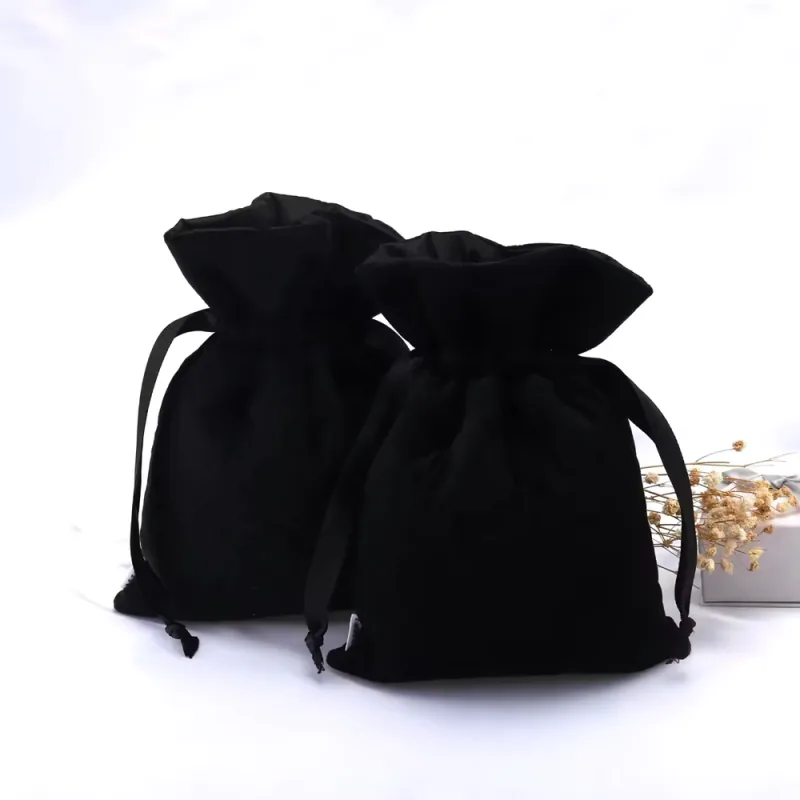 Two black velvet-style drawstring jewelry pouches