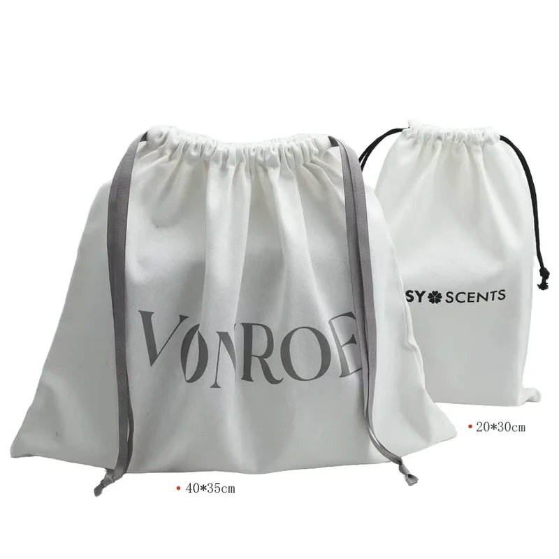 Gray drawstring travel bags in two sizes with gray and black ties.