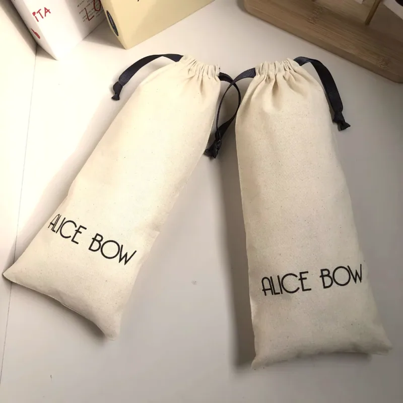 Two long cotton drawstring bag samples with printed logos.