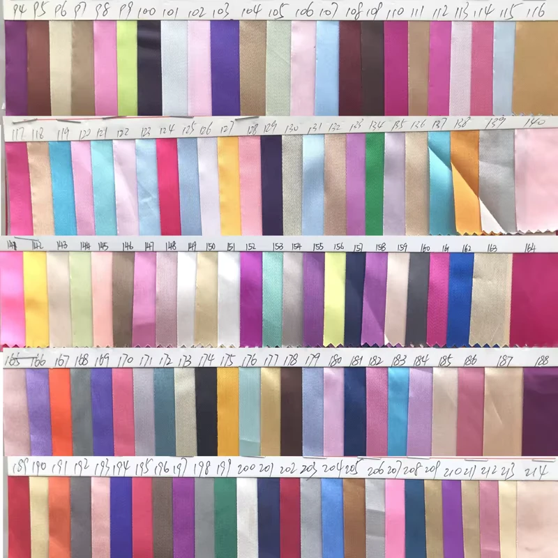 Five rows of fabric color swatches on numbered sample cards.
